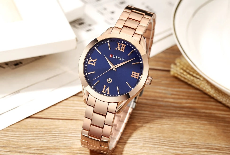C-9007L Curren blue Dial Rosegold Stainless Chain Steel Analog Quartz Women's Watch.