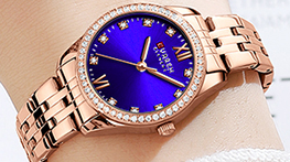 C9086L Curren Blue Dial Rose-gold Stainless Steel Chain Analog Quartz Women's Watch.